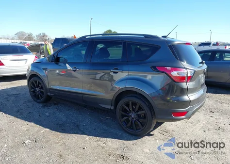 2017 Ford Escape Titanium z USA, uszkodzony, nr VIN 1FMCU0J98HUA93249